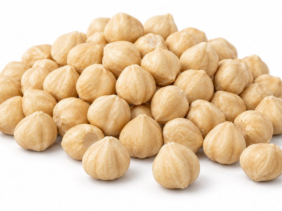 Blanched hazelnut kernels with the skin fully removed, uniform ivory colour