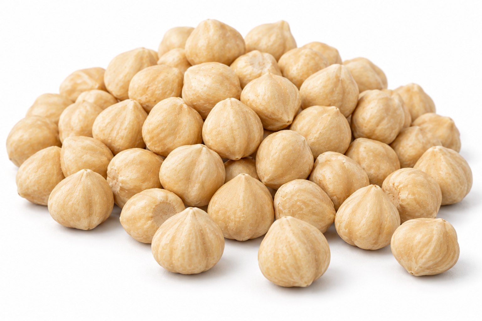 Blanched hazelnut kernels with the skin fully removed, uniform ivory colour